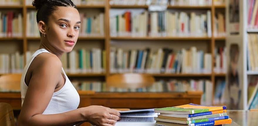 Student sitting in library
